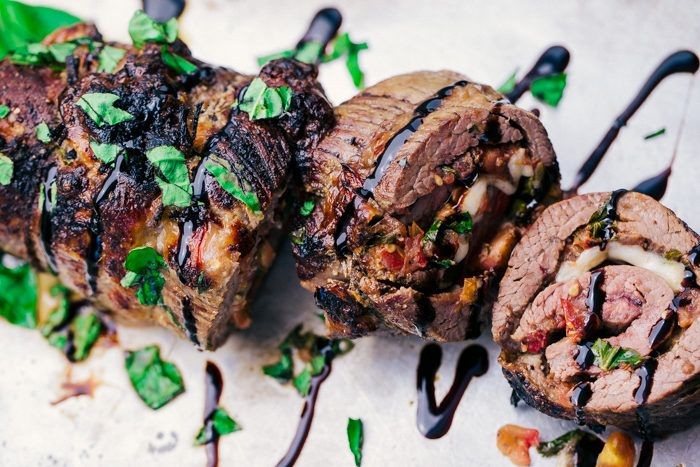 Caprese Flank Steak Pinwheels with Balsamic Glaze