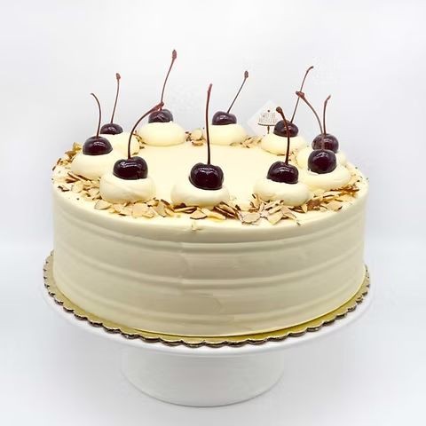 Dark Cherry Almond Cake with Vanilla Bean Frosting