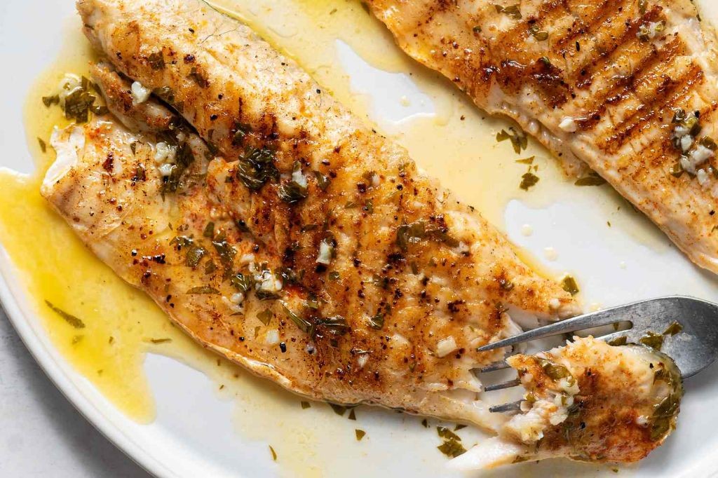 Grilled Chilean Sea Bass with Garlic Herb Butter