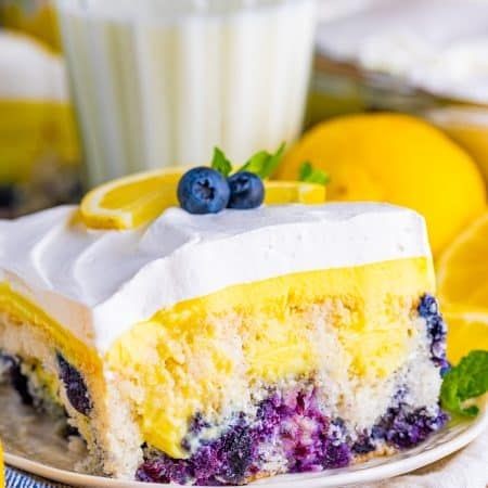 Lemon Pudding Poke Cake with Blueberries