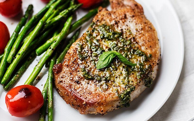 Pesto and Tomato Topped Pork Chops