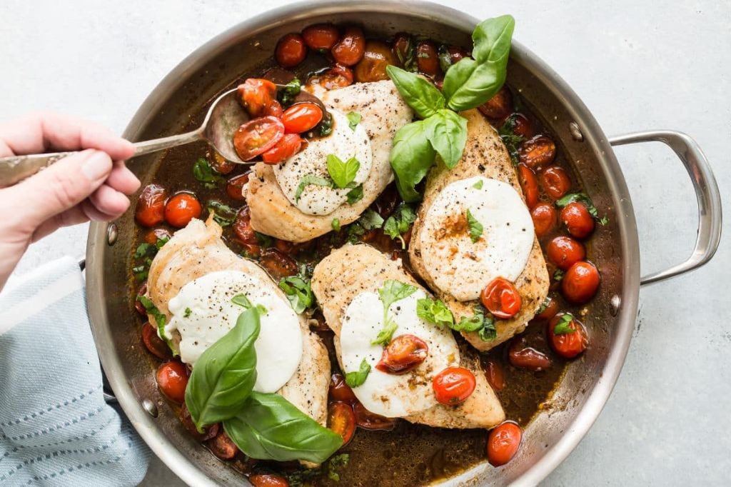 Scored Chicken Breast Caprese with Mozzarella and Tomato